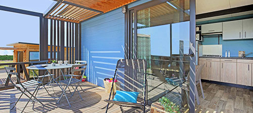 The covered terrace of the Scandinavian chalet