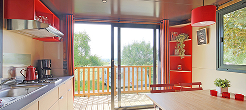 Living room, kitchen and terrace of the gypsy caravan